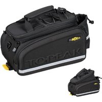 Black Topeak MTX Trunk Bag DX 2.0 with reflective stripe, multiple compartments, and elastic bungee cords on top.