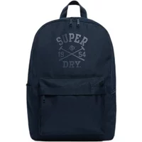 Navy blue Superdry Heritage women's backpack with front zip pocket and logo featuring crossed arrows and "1954".