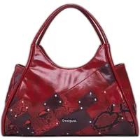Red Desigual Glow Heritown 2.0 Mini handbag with patchwork design, stud accents, and dual handles.