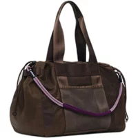 Brown Desigual Neo Grunge Sula handbag with dual handles, front pocket, and purple-accented shoulder strap.