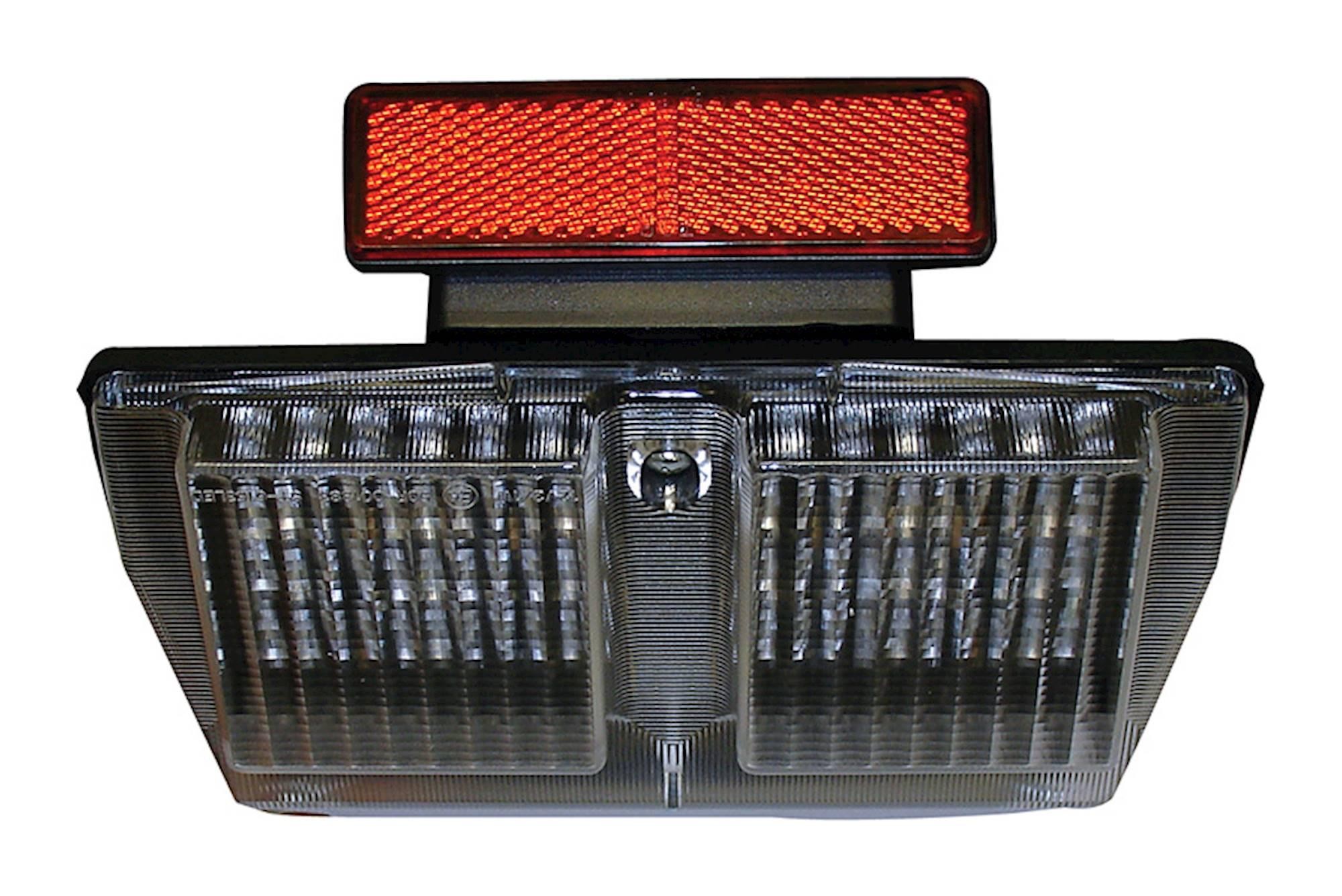 LED rear tail light with a clear lens, integral indicators, and a red reflective section, designed for Ducati 998 Biposto models from 2001-2003, featuring a sleek black housing.
