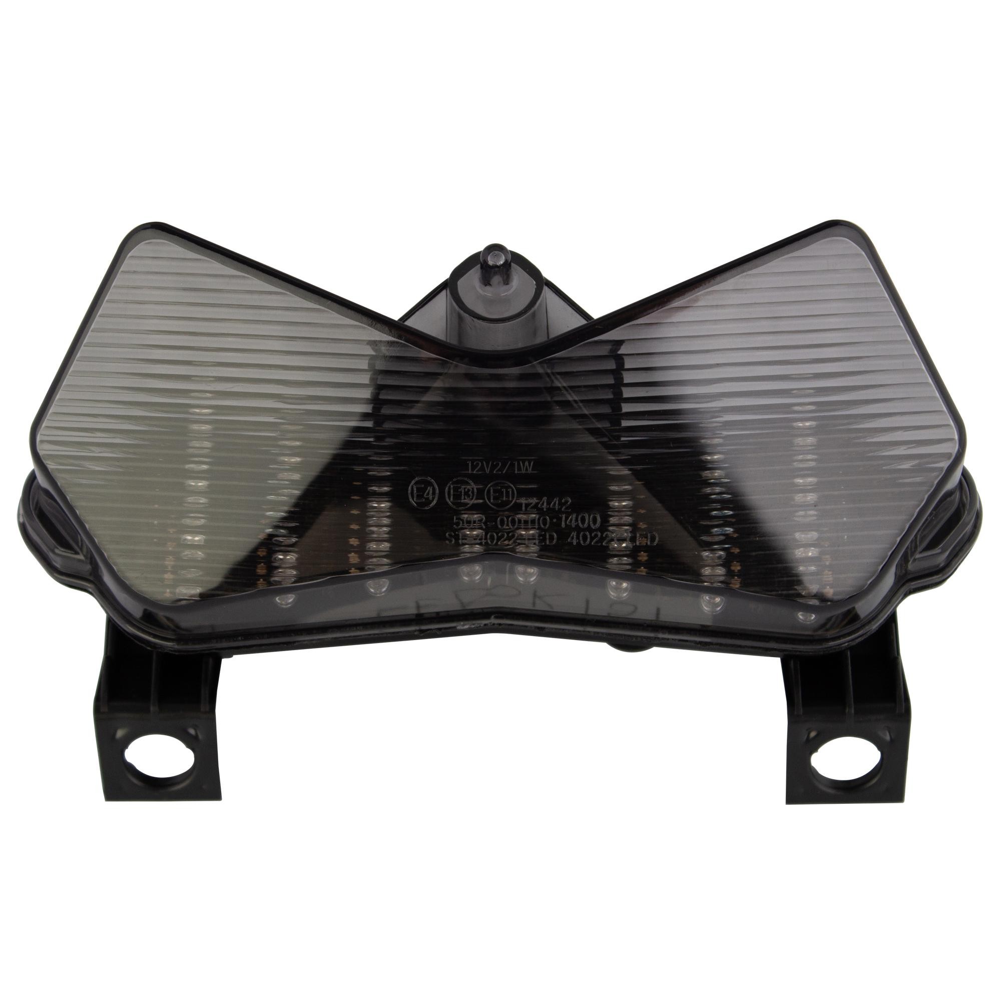 LED rear tail light with a cool grey lens, featuring a sleek, angular design, black plastic housing, and multiple LED lights, compatible with Kawasaki Z750 models from 2003 to 2006.