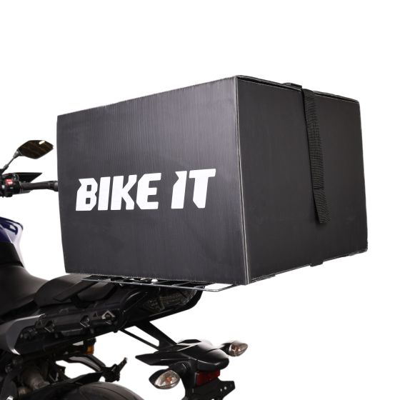 Black multi-functional delivery box with a textured surface, featuring a prominent white "BIKE IT" logo, securely attached to a motorcycle's rear rack.