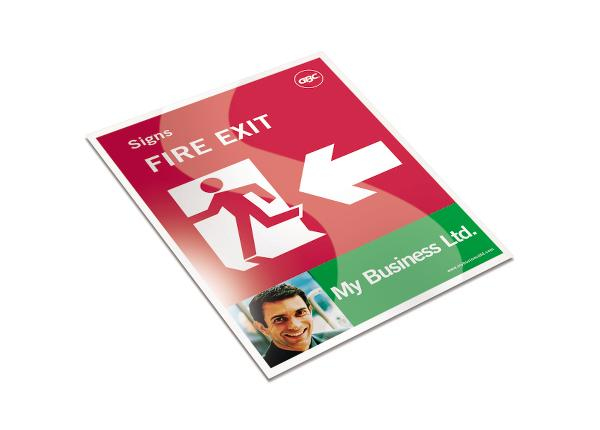 A5 lamination pouch featuring a red "FIRE EXIT" sign with an arrow, a green section labeled "My Business Ltd." and a photo of a man in the bottom corner, made from 125-micron adhesive material.
