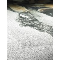 Hahnemühle German Etching White Matt paper with textured surface and subtle gray and beige abstract design.