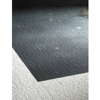 Textured white Hahnemühle William Turner paper with a visible corner, showcasing a fine art print surface.
