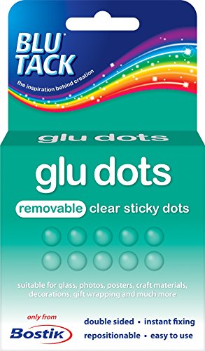 Green and blue packaging featuring "Glu Dots" text, showcasing 200 clear adhesive dots, labeled as removable and suitable for various crafting and decorating uses.