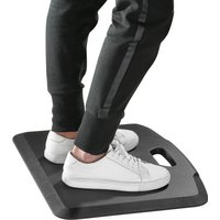 Black ProperAV anti-fatigue mat with rubberised-gel foam, beveled edges, and built-in handle, supporting feet in sneakers.