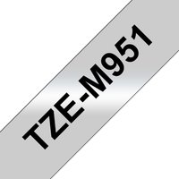 Brother TZE-M951 label-making tape, black text on metallic silver background, angled view.