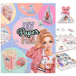 Colorful DIY Paper Fun book featuring a stylish girl on the cover, surrounded by stickers and craft materials, with a pastel-themed background and playful accessories.