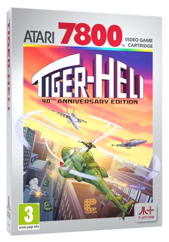 Colorful video game cartridge box featuring "Tiger-Heli" title, with a green helicopter and two gray helicopters against a vibrant sunset background, marked as 40th Anniversary Edition.