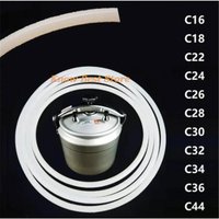 Silicone rubber gasket sealing ring set for pressure cooker, various sizes from 24cm to 44cm, shown with a metal cooker.