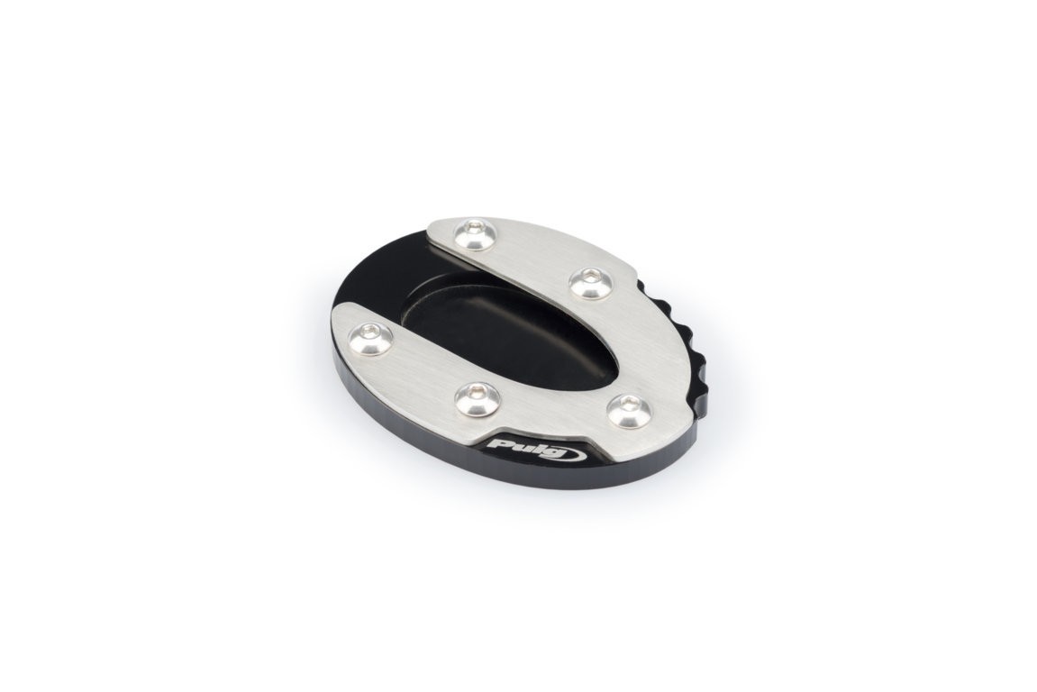 Black kickstand extension pad with a silver aluminum top, featuring six silver screws and a textured grip on one side, designed for Kawasaki Ninja 1000 SX models (2020-2024).