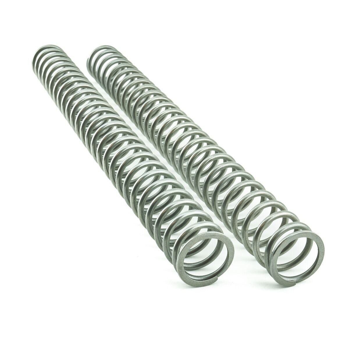 Two metal fork springs with a silver finish, featuring a tightly wound coil design, specifically designed for Honda CRF250R models from 2025 to 2026, rated at 4.4 N/mm.