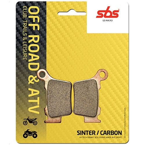 SBS 872SI sintered rear brake pads for Husqvarna CR65, featuring a carbon material with a gold and gray color scheme, packaged on a yellow and black card with off-road graphics.