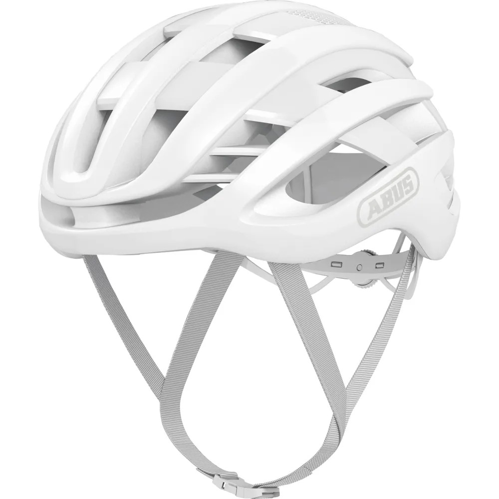 Pure white Abus AirBreaker road bike helmet featuring a sleek aerodynamic design, ventilation slots, and adjustable straps for a secure fit.