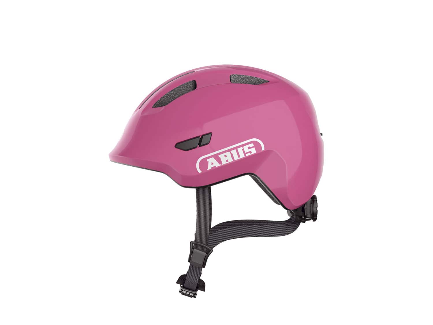 Shiny pink Abus Smiley 3.0 kids helmet in medium size, featuring ventilation slots, adjustable straps, and a glossy finish for safety and style.