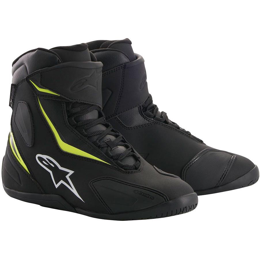 Black and yellow fluo Alpinestars Fastback 2 Drystar CE motorcycle boots, featuring a sleek design, lace-up front, padded collar, and reinforced toe and heel areas.