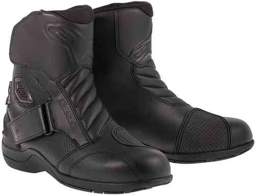 Black Alpinestars Gunner WP motorcycle boots, size 44 (UK 10), featuring a sleek design, textured leather, adjustable strap, and reinforced toe and heel for protection.