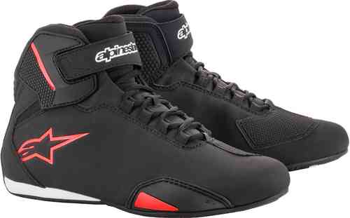Black and red Alpinestars Sektor motorcycle boots featuring a sleek design, lace-up front, Velcro strap, and reinforced toe and heel for added protection.