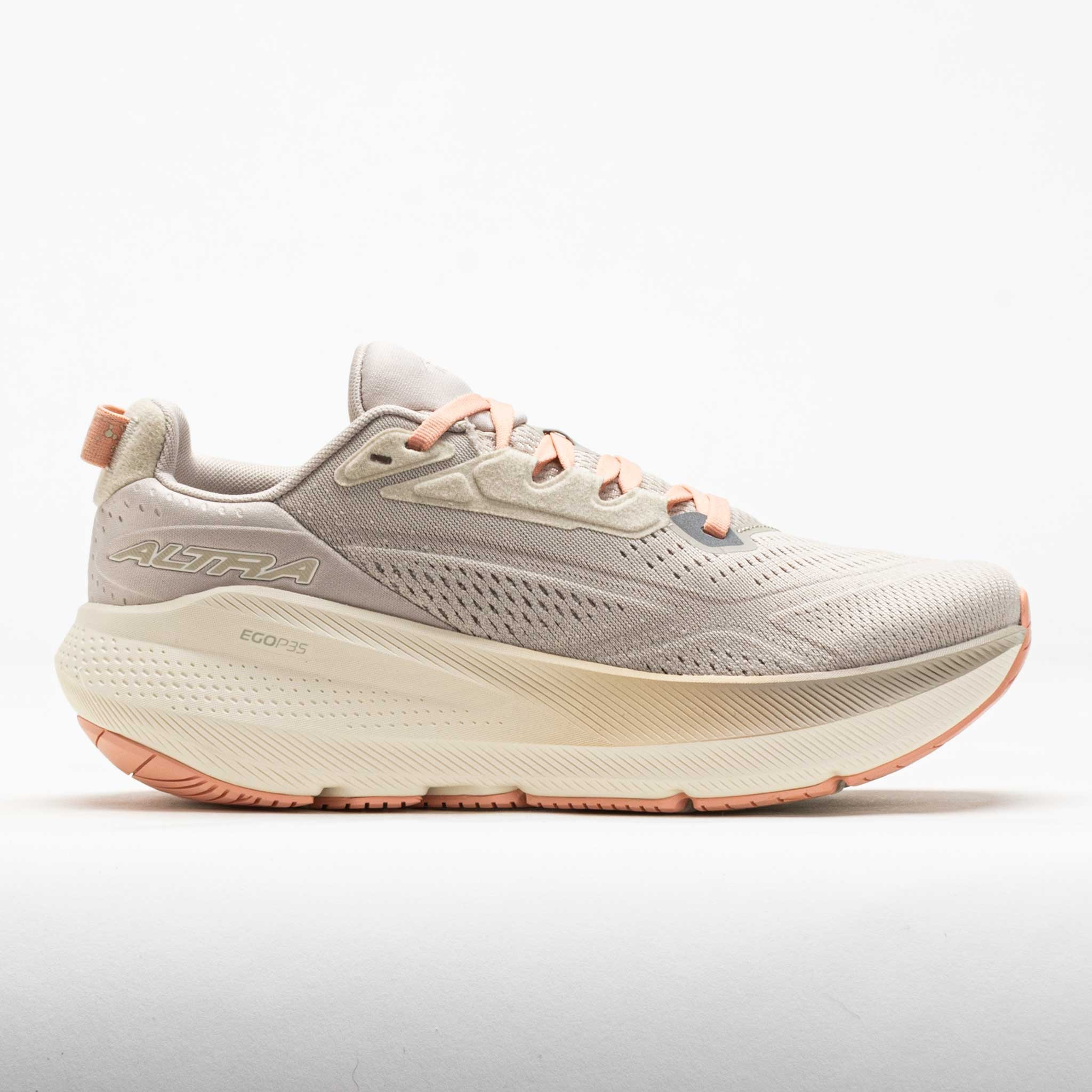 Tan Altra FWD Via 2 women's shoes in size 10, featuring a breathable mesh upper, soft cushioning, and a lightweight design with peach accents.