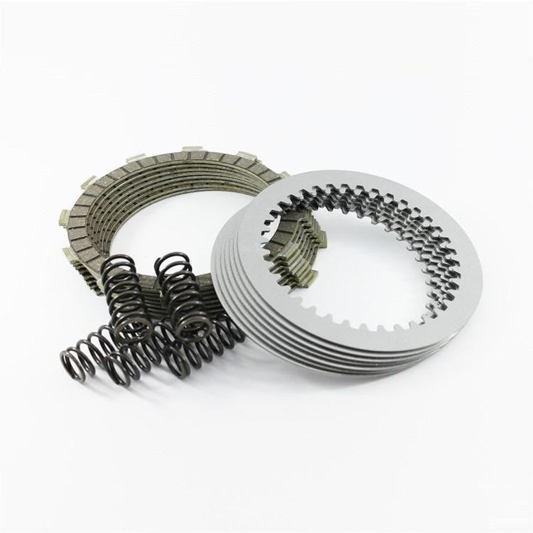 Apico Performance Clutch Kit featuring multiple friction plates, steel plates, and black coil springs, designed for Honda CR125 (1986-1999) and KTM SX/EXC/TE 125-200 (1998-2018).