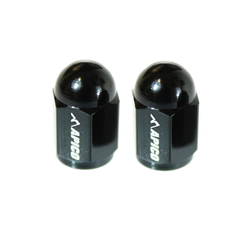 Two black CNC machined aluminum valve caps with a rounded top and the "Apico" logo engraved on the side, designed for durability and style.