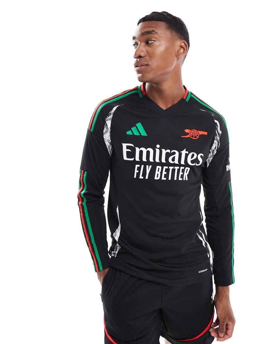 Black long sleeve Adidas Performance Arsenal 2024/25 away jersey featuring green and red stripes, Emirates logo, and a sleek design with a comfortable fit.