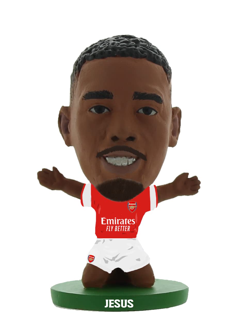 A detailed figurine of Gabriel Jesus in an Arsenal home kit, featuring a red jersey with white sleeves, black hair, and a green base labeled "JESUS."