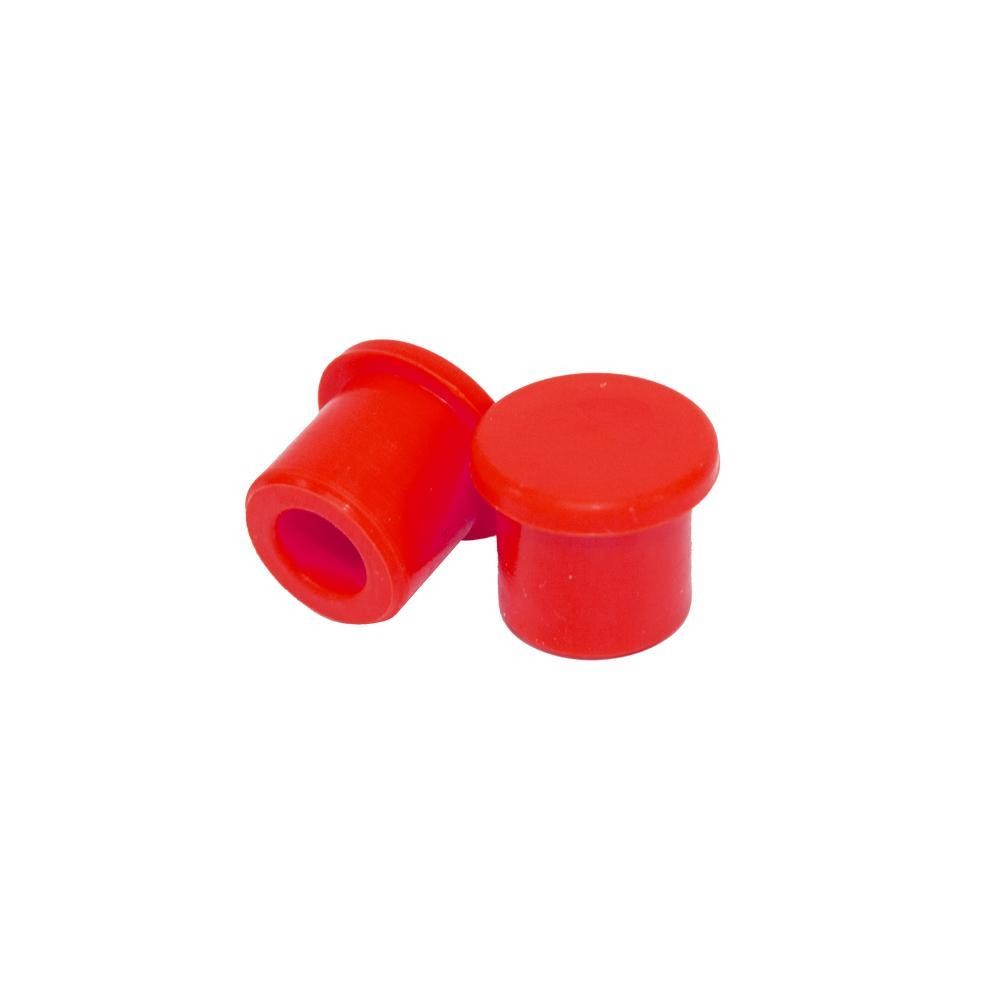 Set of 2 red silicone push-on valve caps with a smooth surface and rounded tops, designed for trials bikes, featuring a snug fit for secure sealing.