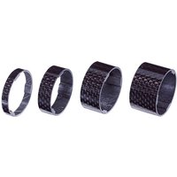 Set of four carbon fiber headset spacers, varying heights, black with glossy finish, for 1 1/8 inch bike stems.