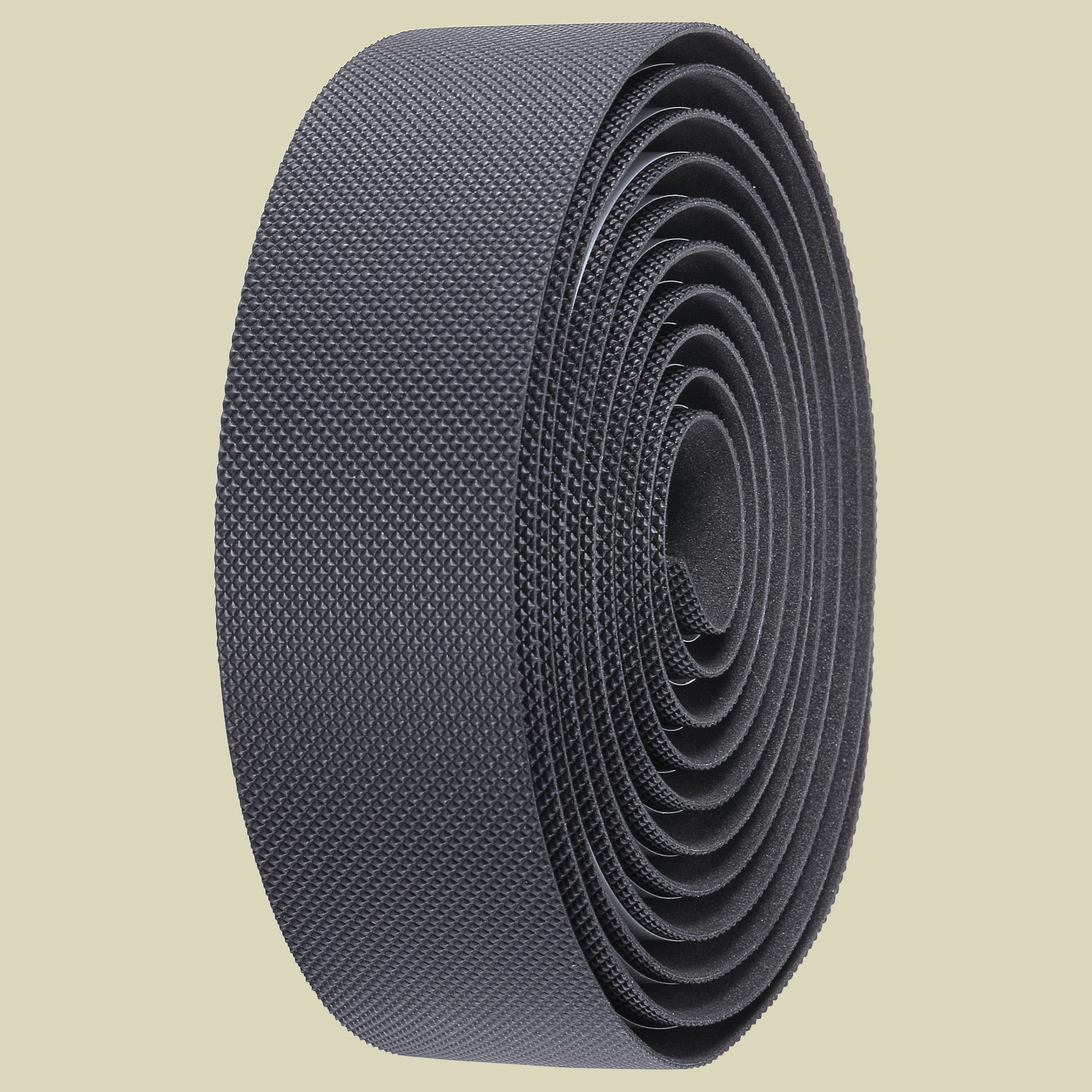 Black textured gel bar tape rolled up, featuring a grippy surface designed for comfort and control on gravel bikes.