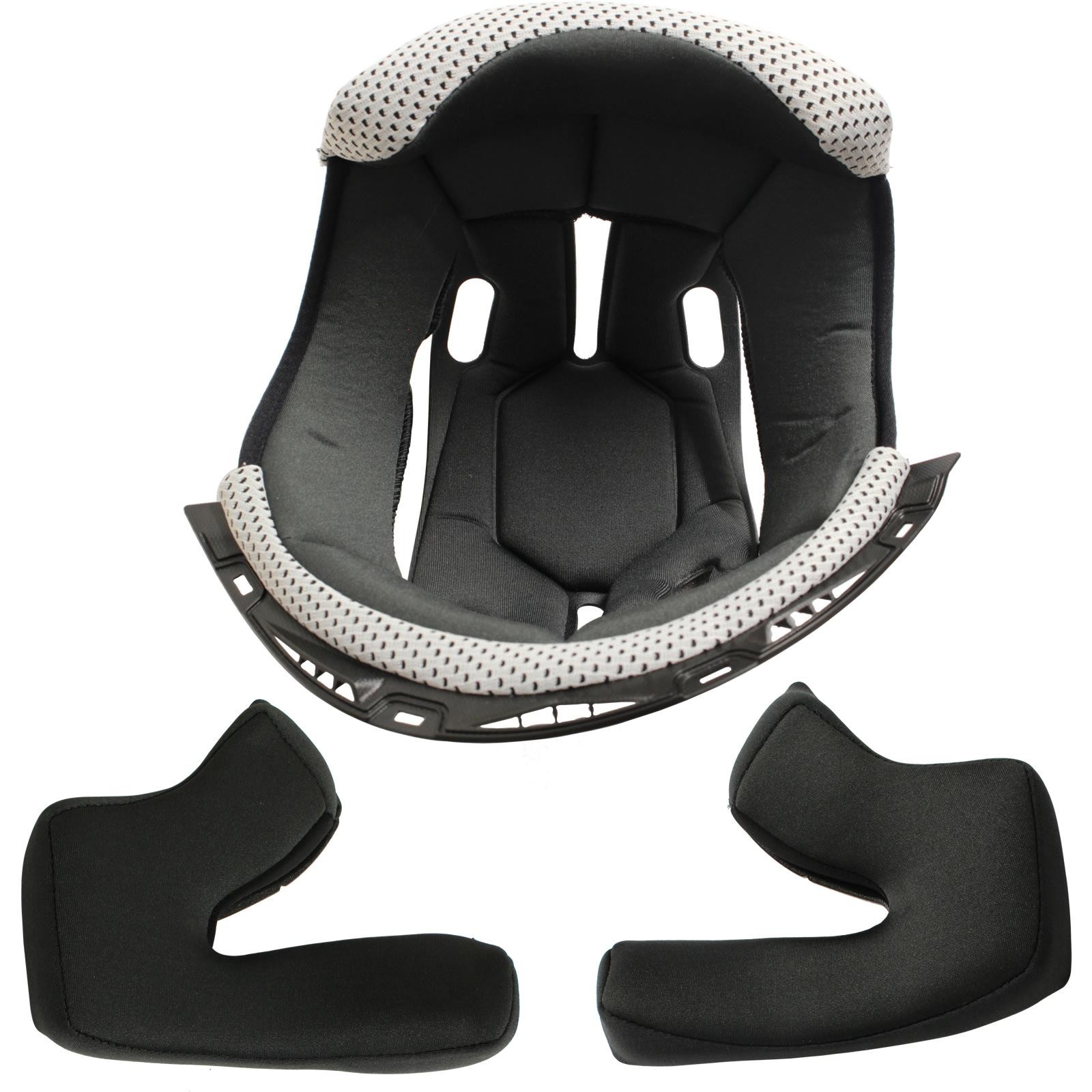 Black helmet liner with a grey padded interior and polka dot detailing, featuring removable side pads for comfort and fit adjustment.