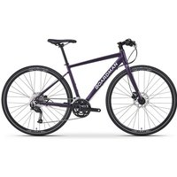 Purple Boardman HYB 8.6 women's hybrid bike with flat handlebars, disc brakes, and 700c wheels.