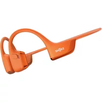 Orange bone conduction headset Shokz Openrun Pro 2 Mini with wraparound band and open-ear design.