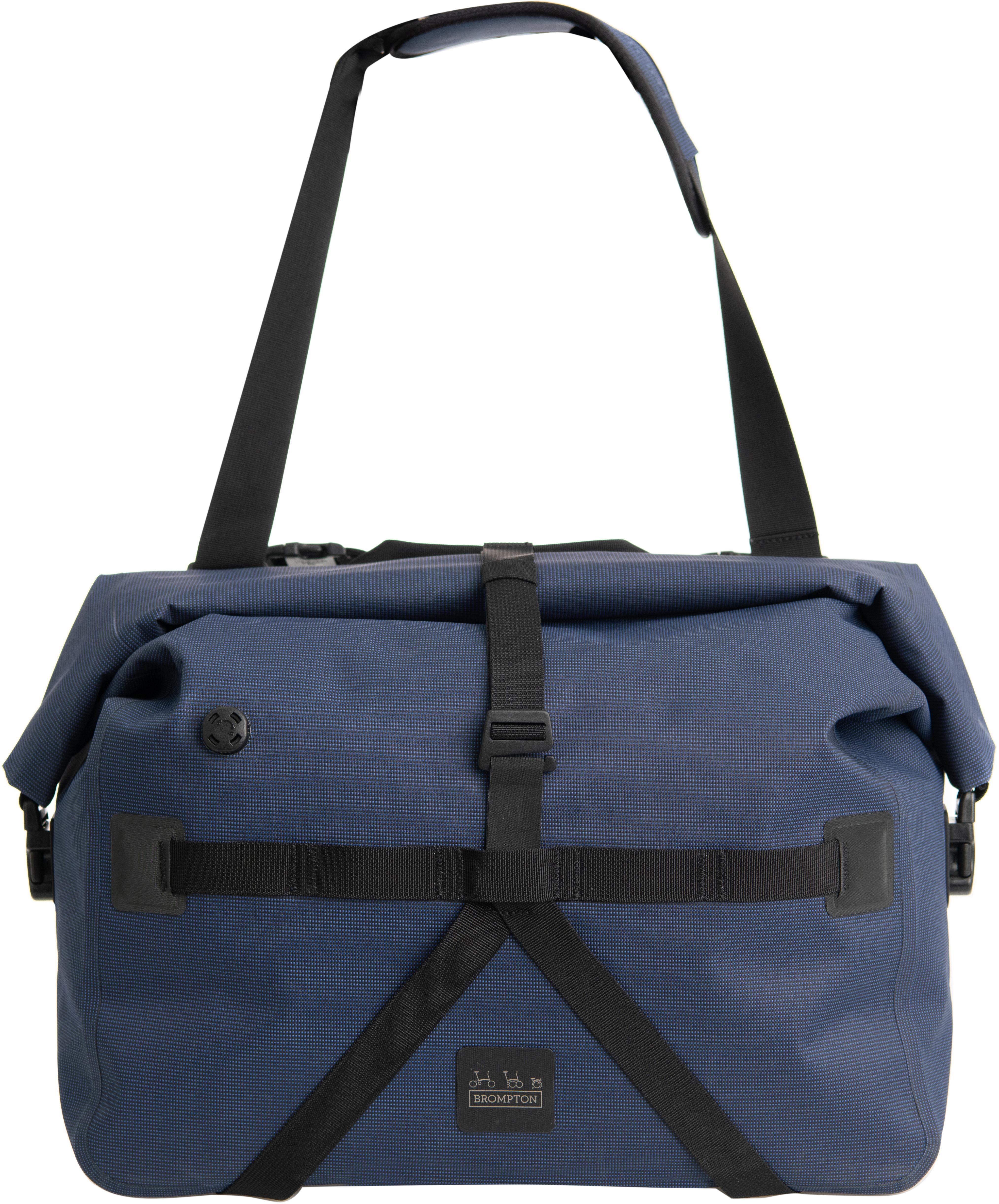 Navy Brompton Borough roll top bag, 25L, waterproof, with black adjustable strap and front buckle closure.