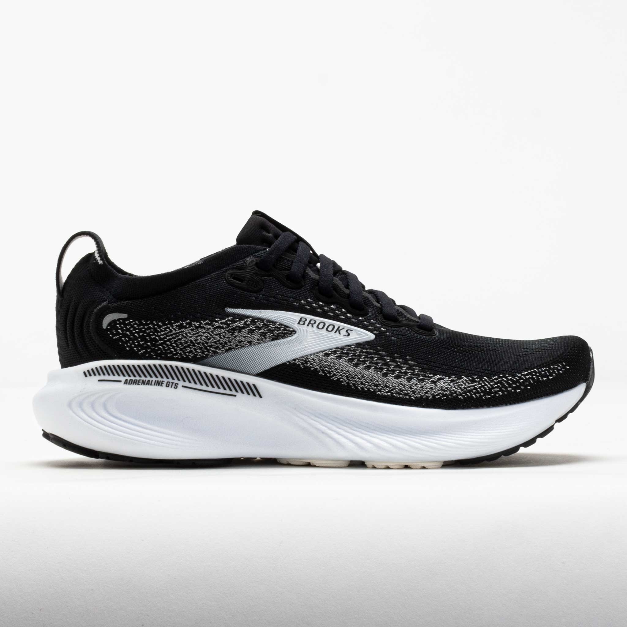 Men's Brooks Adrenaline GTS 25 running shoes in black, grey, and white, featuring a textile upper, cushioned sole, and reflective detailing for enhanced visibility.