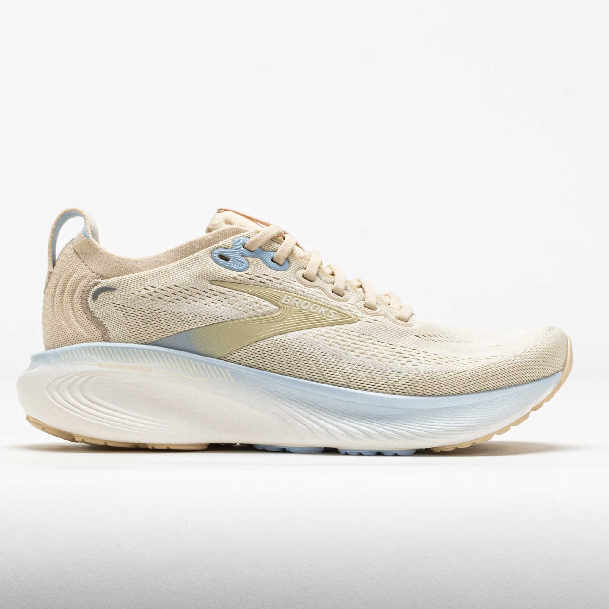 Brooks Adrenaline GTS 25 sneakers in sand, coconut, and skyway colors, featuring a breathable mesh upper, cushioned sole, and reflective detailing, size US 7.5.