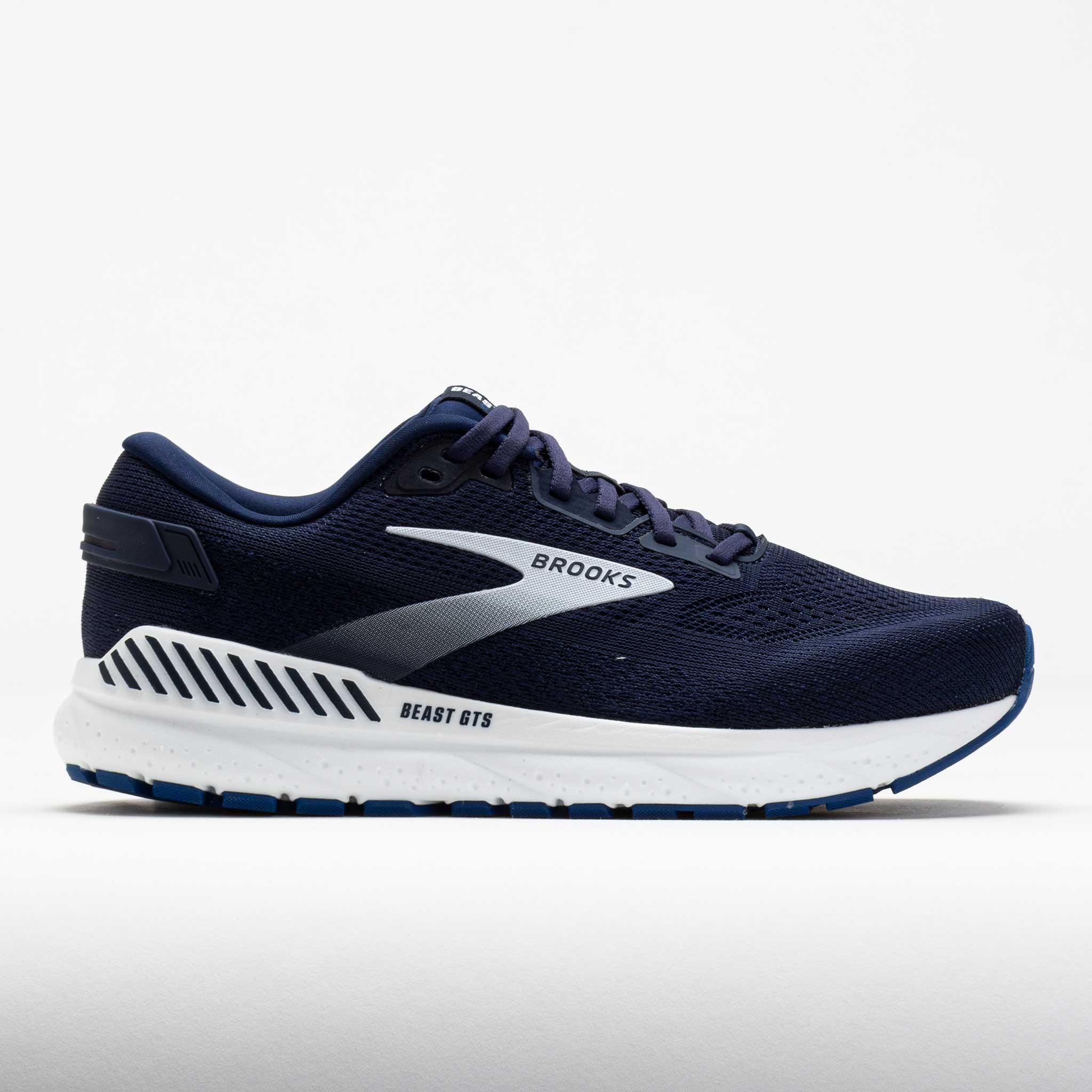 Men's Brooks Beast GTS 24 running shoe in navy blue, featuring a breathable mesh upper, cushioned sole, and reflective detailing for visibility.