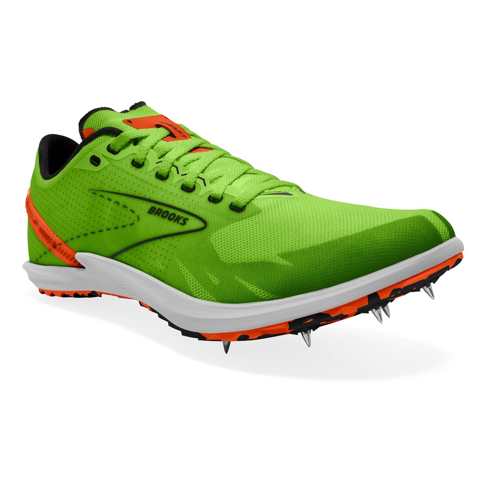 Bright green cross country running shoe with red-orange accents, featuring a lightweight mesh upper, cushioned sole, and metal spikes for traction, size 4.5.
