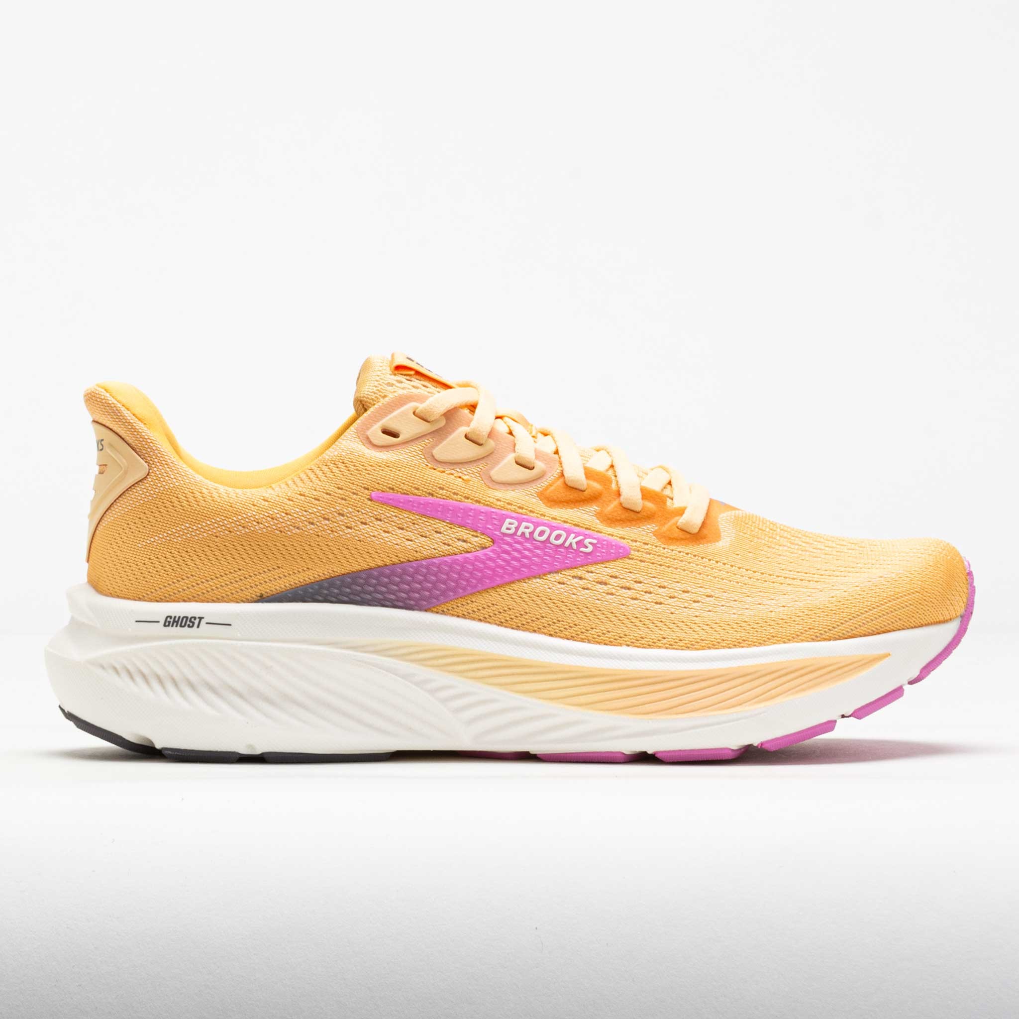 Women's Brooks Ghost 17 running shoes in vibrant orange with pink accents, featuring a breathable mesh upper, cushioned sole, and sleek design for optimal comfort and performance.