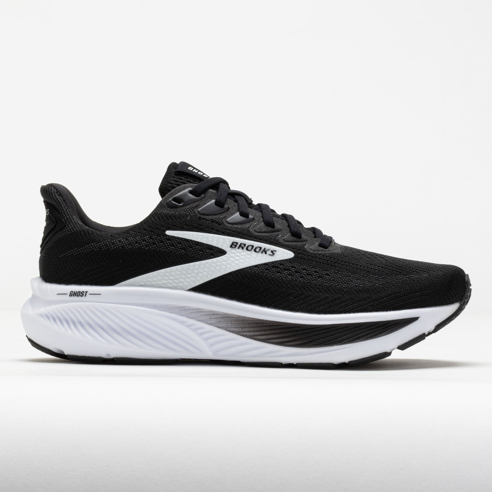Women's Brooks Ghost 17 running shoes in black and white, featuring a breathable mesh upper, cushioned sole, and sleek design for comfort and support.