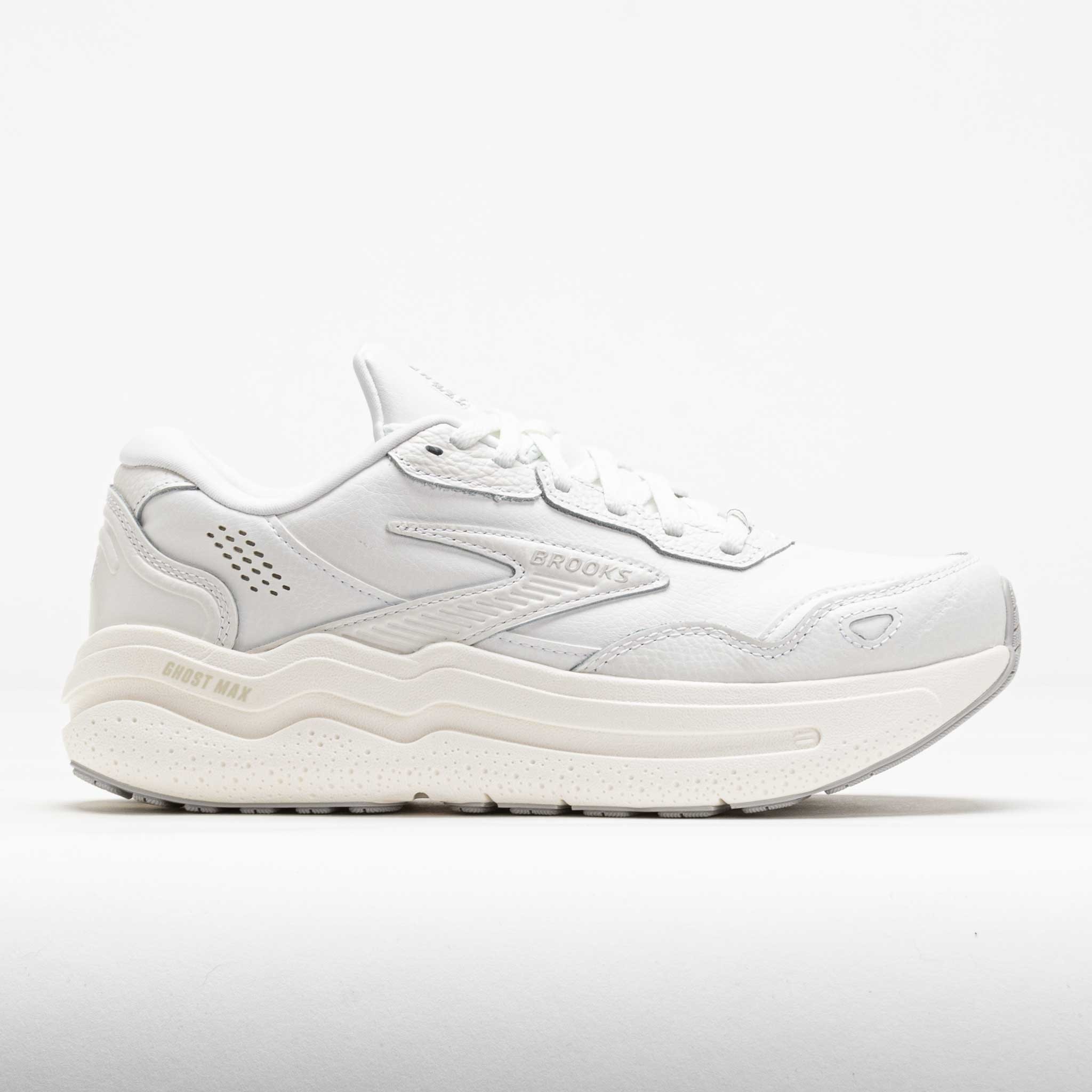 White leather Brooks Women's Ghost Max 2 shoes featuring a cushioned sole, sleek design, and subtle branding on the side.