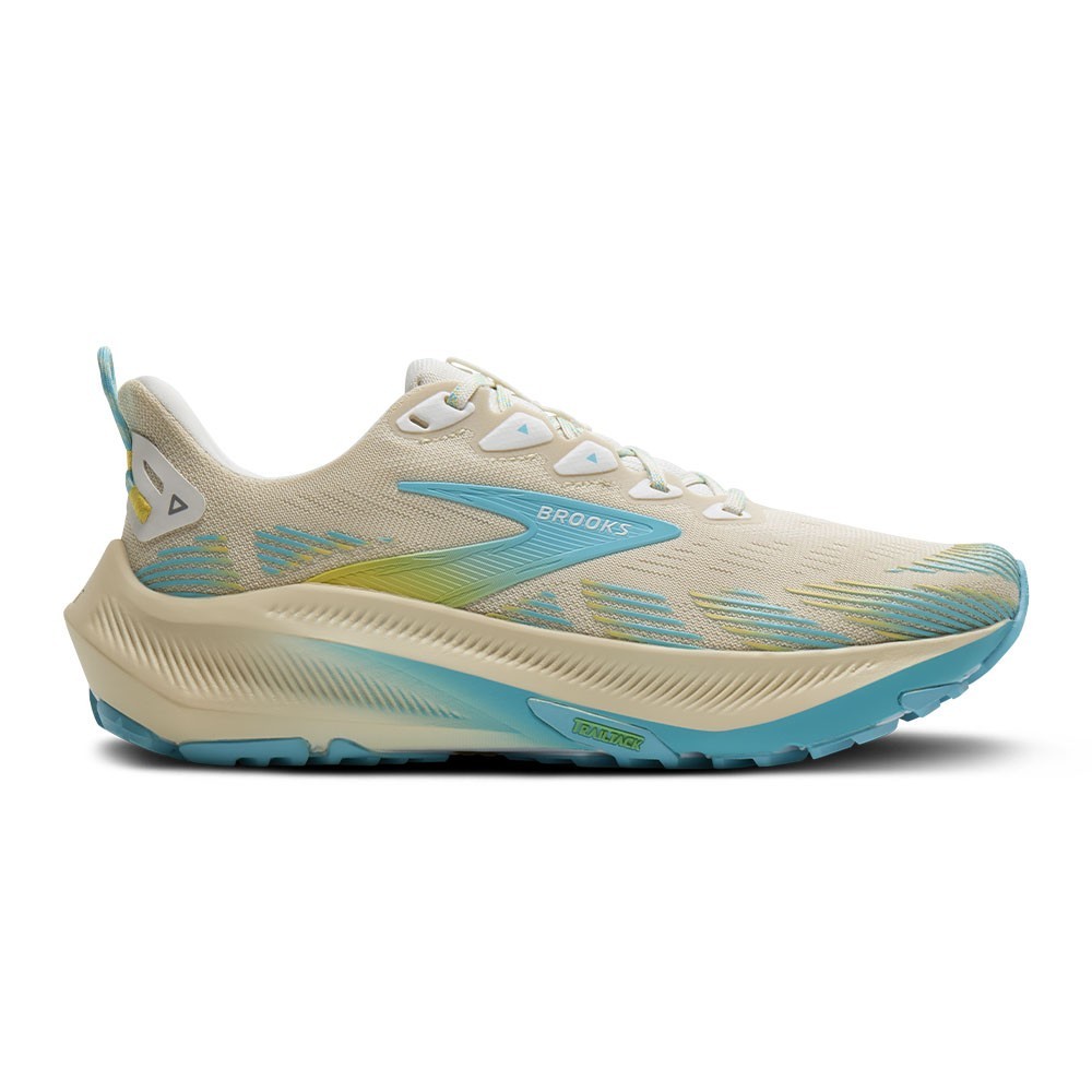 Women’s Brooks Ghost Trail Running Shoes in sand, star white, and golden hour colors, featuring a breathable mesh upper, cushioned sole, and a stylish design for outdoor running.