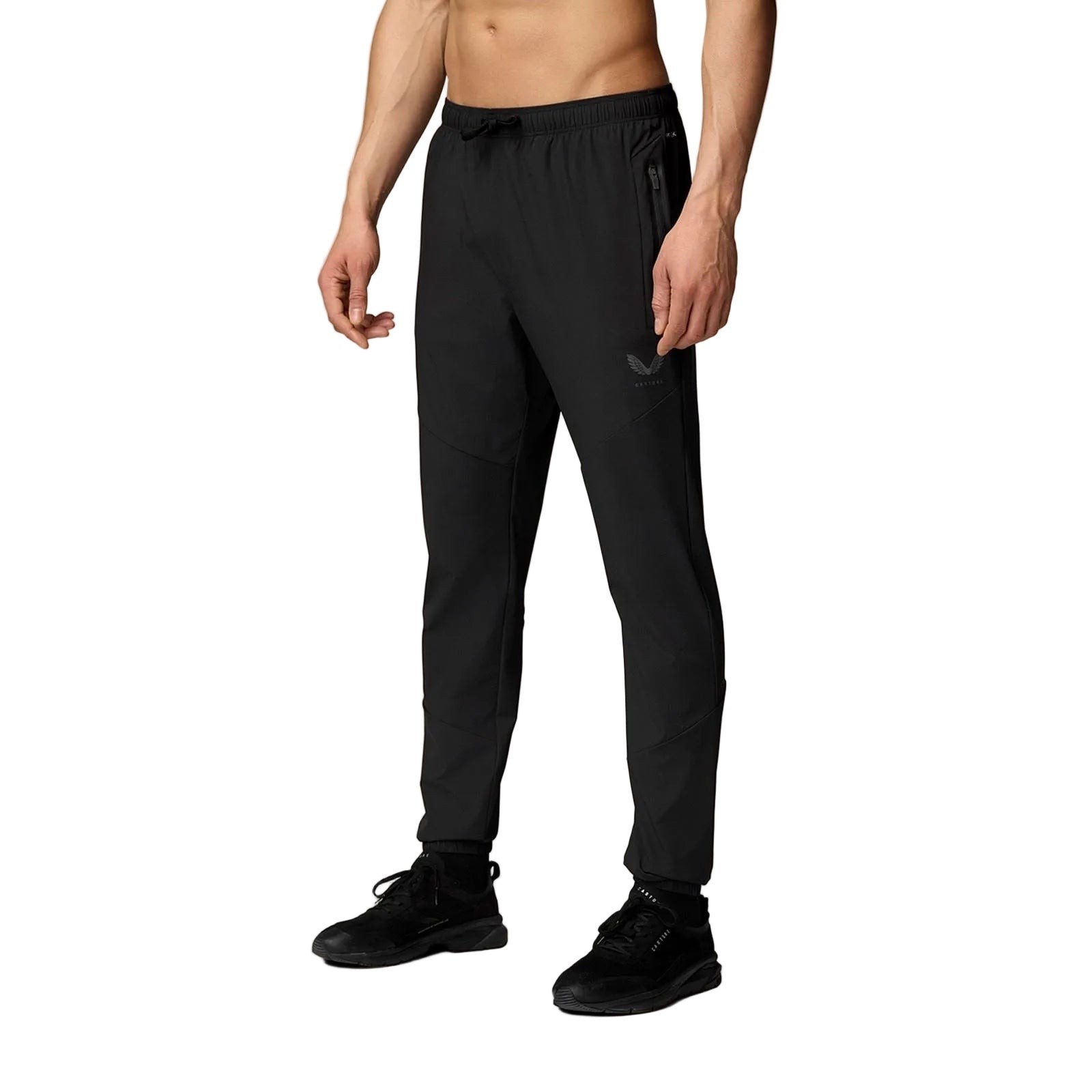 Lightweight black joggers for men by Castore, featuring a drawstring waist, tapered fit, and zippered side pockets, made from breathable material for comfort and flexibility.