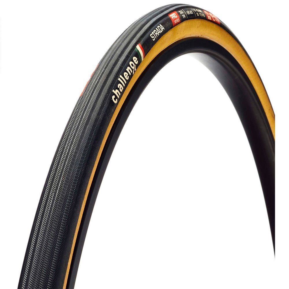 Handmade road tyre in black with a tan sidewall, featuring a textured surface and "Challenge Strada" branding, sized 700 x 27.