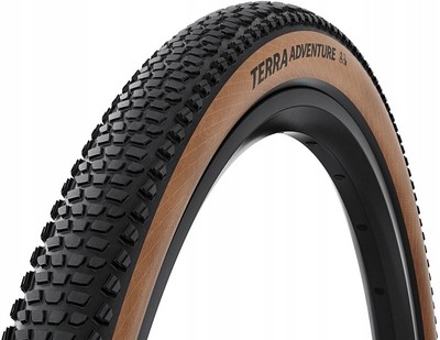 Continental Terra Adventure Trail Tyre in black and transparent, featuring a textured tread pattern and a tan sidewall, sized 700 x 45 for versatile trail performance.
