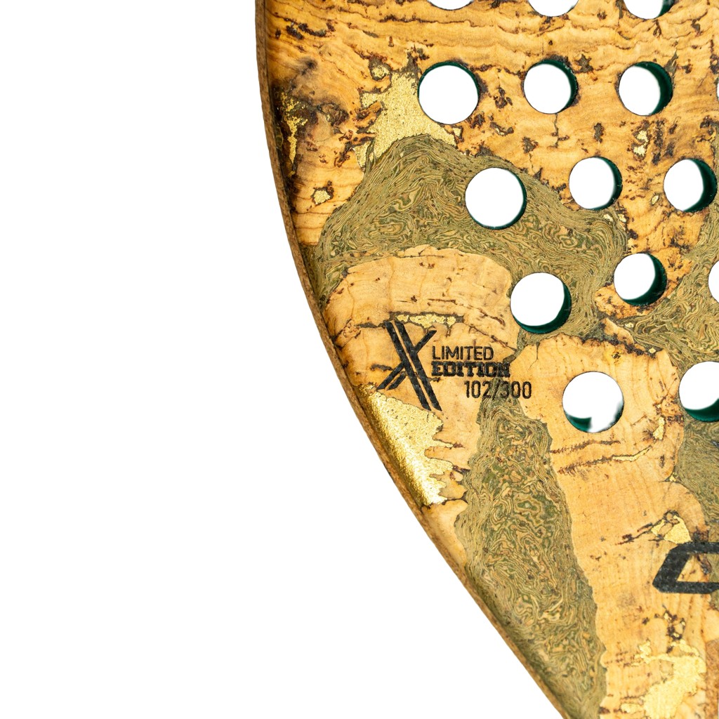 Cork Extreme Green Padel Racket features a unique cork surface with green accents, a limited edition mark, and multiple perforations for enhanced playability.