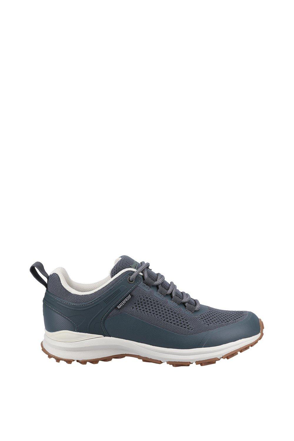 Dark blue waterproof women's shoes by Cotswold, featuring a mesh upper, white accents, and a durable rubber sole for traction.
