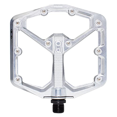 Silver Crankbrothers Stamp 7 flat pedal features a large, lightweight aluminum body with a textured surface and multiple grip pins for enhanced traction.